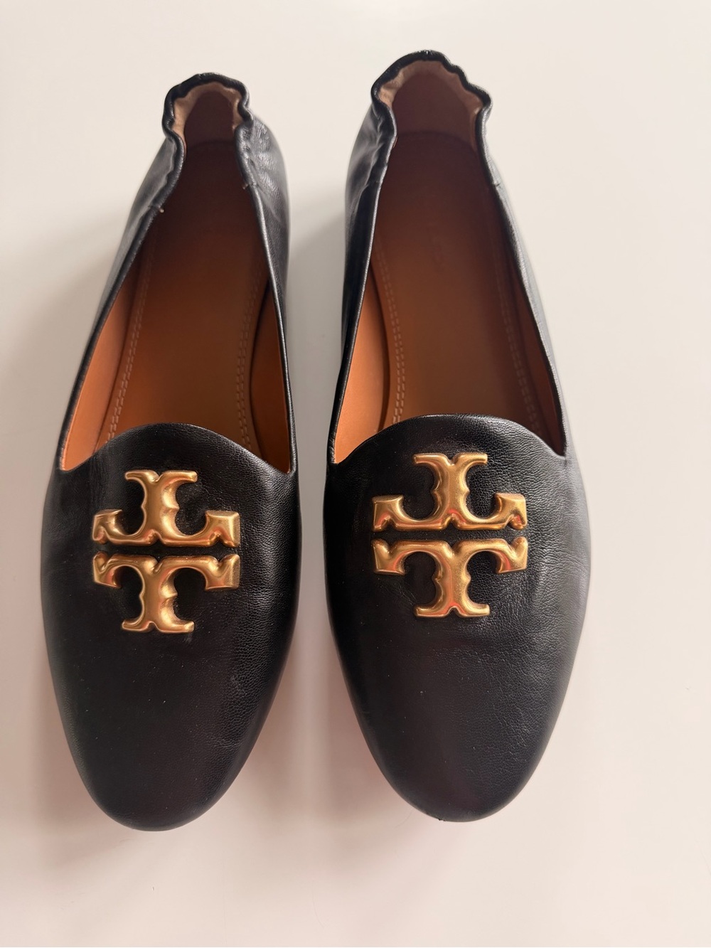Tory Burch Eleanor Black Leather Slip-On Flats with Gold Logo Accent
